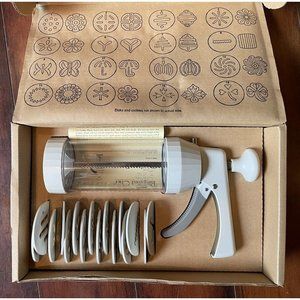 The Pampered Chef 1525 Cookie Press with 16 Discs - White (discountinued)